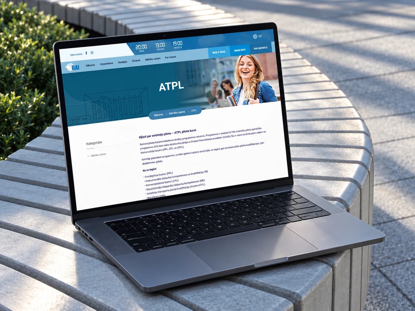 The ATPL pilot training programme on rai.lv on a laptop on a silver bench.